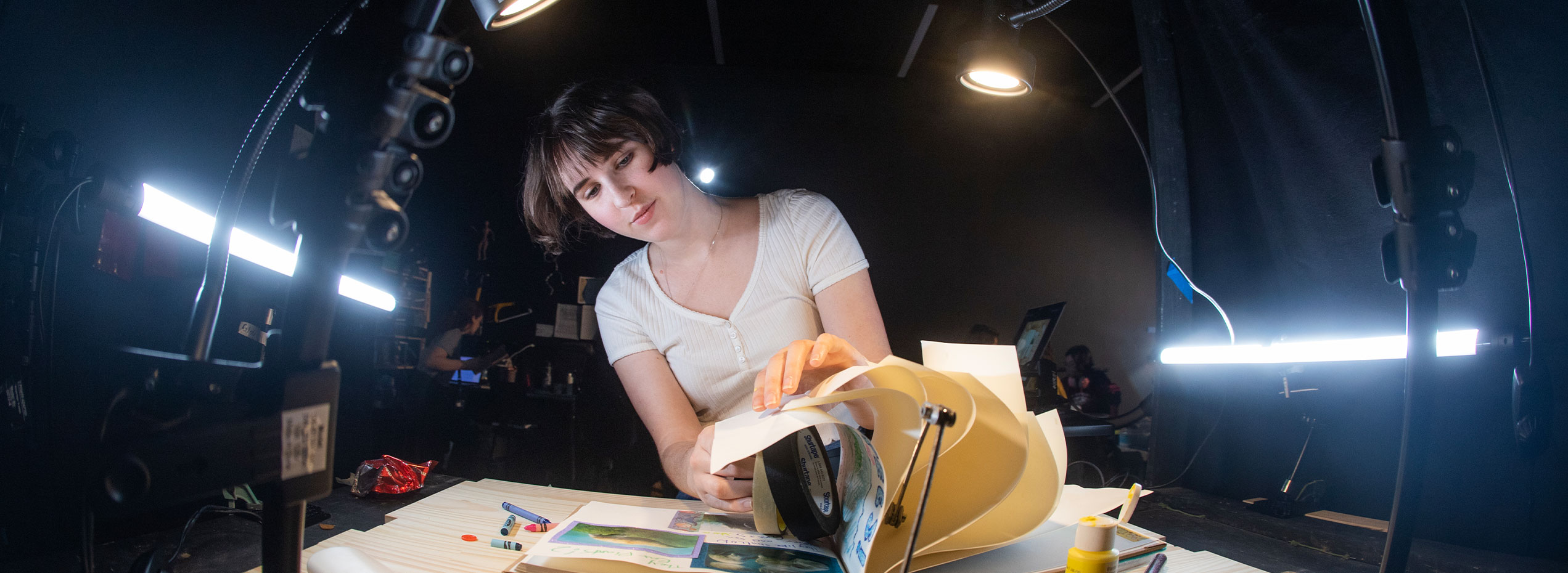 A photo of a student steeping off of the LCAD shuttle.