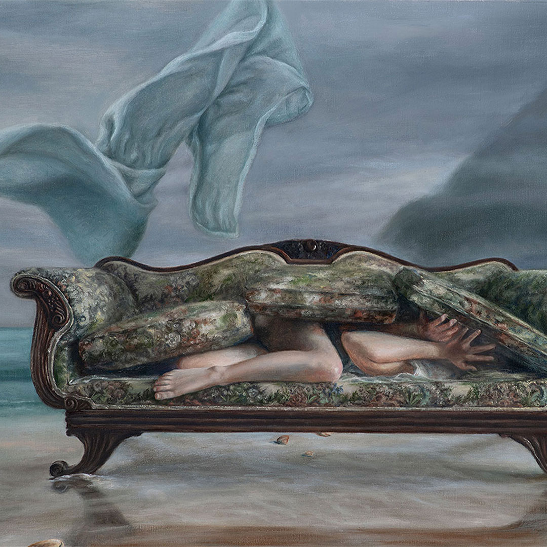 A Painting of a woman buried inside a couch on a beach.