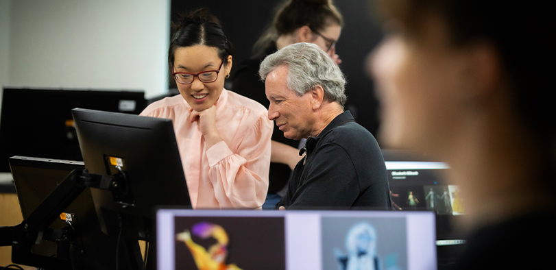 A photo of a student presenting at IOH.