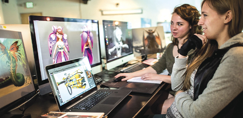 A photo of students working at computers.