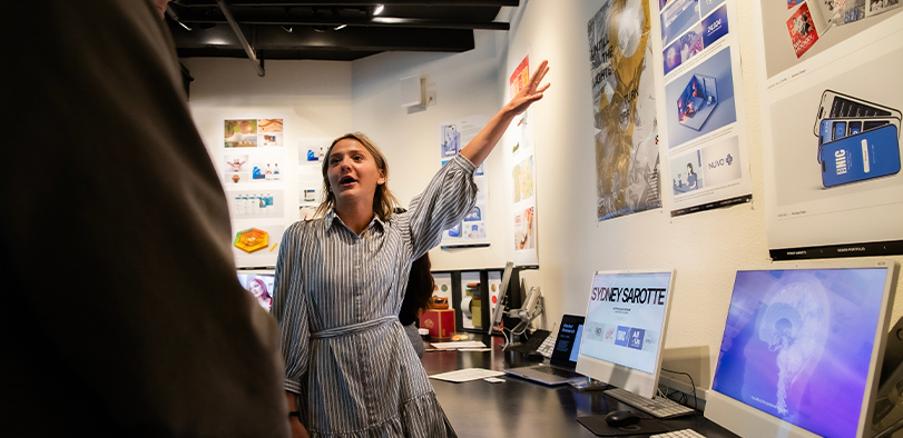 A photo of a student presenting their work.