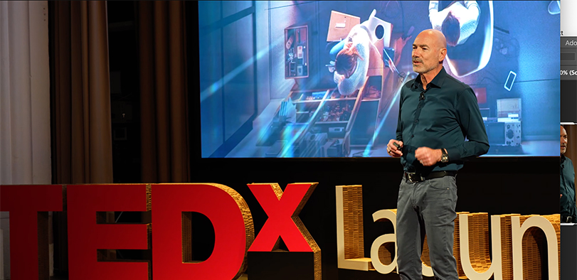 A photo of Steve Brittan giving a TEDx talk.