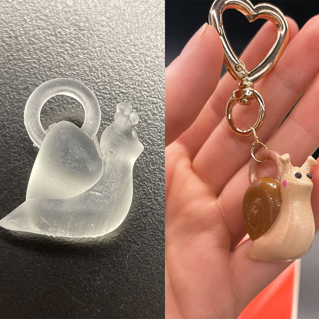 A photo of a snail image on a computer, a resin version of the snail, and then the snail fully painted and made into a real keychain.