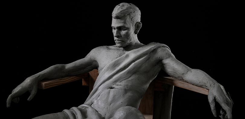 A photo of a sculpture of a man.