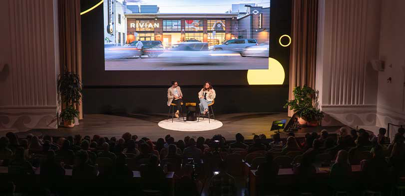 A photo of Cherry giving a talk on the Rivian stage.