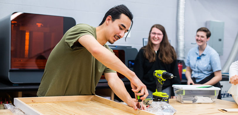 A photo of students working in the fablab.