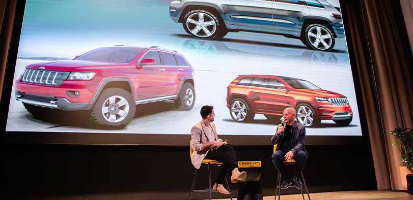 A photo of Hammoud giving a talk on the Rivian stage.