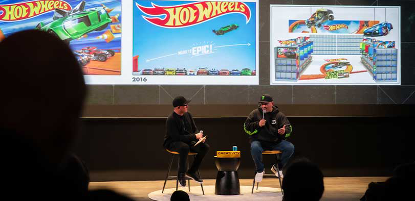 A photo of maartinez giving a talk on the Rivian stage.