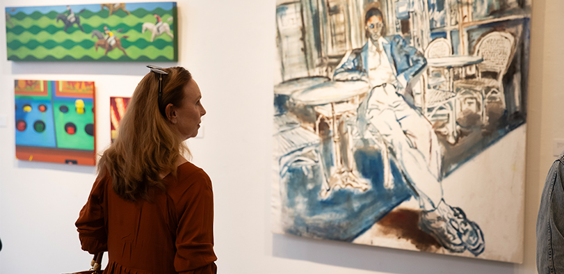 A photo of a person at the LCAD Gallery.