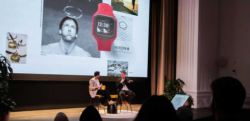 A photo of Snyder giving a talk on the Rivian stage.