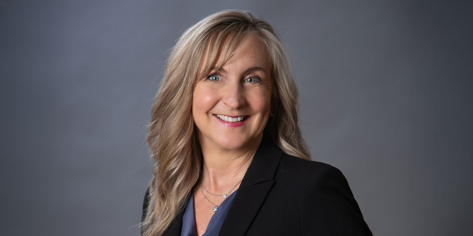 A headshot of Kathy Reed